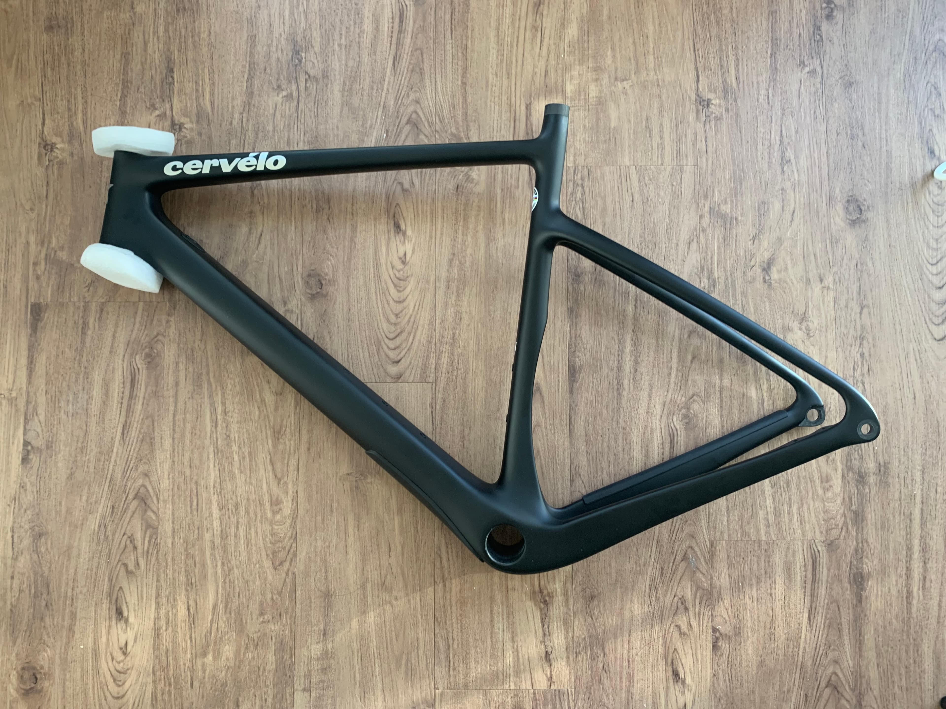 Bare Cervélo Áspero carbon frameset on the work stand